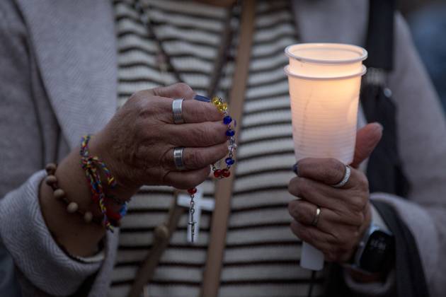 October 11, 2025, Madrid, Madrid, Spain: Members of the Venezuelan community in Madrid holding candles and Venezuelan flags in Opera Square in downtown Madrid, during a vigil to pray the rosary for the beatification of Venezuelans Jose Gregorio Hernandez and Carmen Rendiles on October 19, 2027, in St. Peter s Square, Rome. Madrid Spain - ZUMAs296 20251011_znp_s296_008 Copyright: xLuisxSotox
