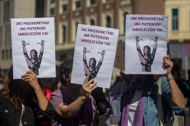 October 11, 2025, Madrid, Spain: Protesters hold placards during a demonstration organized by the Madrid Feminist Movement (MFM) under the slogan Abolitionist Law Now, to demand that the Spanish government and political groups approve a prostitution abolitionist law. Madrid Spain - ZUMAs197 20251011_aaa_s197_158 Copyright: xDavidxCanalesx