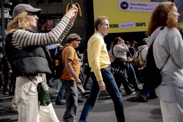 October 18, 2025, New York, New York, USA: Protesters march down Broadway during the Ã¢â‚¬oeNo KingsÃ¢â‚¬Â rally in New York, Saturday, Oct. 18, 2025. The demonstration began in Times Square and ended in Union Square, drawing an estimated 50,000 people who joined others across the country calling for the protection of democratic institutions and denouncing authoritarian leadership. Organizers said more than 5 million people participated in over 2,000 marches nationwide. New York USA - ZUMAa306 20251018_znp_a306_008 Copyright: xJavierxAlvarezx