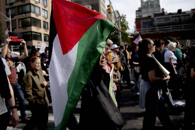 October 18, 2025, New York, New York, USA: Protesters march down Broadway during the Ã¢â‚¬oeNo KingsÃ¢â‚¬Â rally in New York, Saturday, Oct. 18, 2025. The demonstration began in Times Square and ended in Union Square, drawing an estimated 50,000 people who joined others across the country calling for the protection of democratic institutions and denouncing authoritarian leadership. Organizers said more than 5 million people participated in over 2,000 marches nationwide. New York USA - ZUMAa306 20251018_znp_a306_009 Copyright: xJavierxAlvarezx