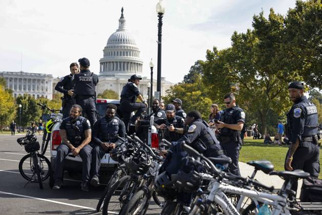 October 18, 2025, Washington Dc, Washington Dc, USA: United States Capitol Police officers are seen while demonstrators take part in a protest against the Donald Trump administration during the No Kings national rally on October 18, 2025, in Washington, DC, USA. Millions of people across the nation joined the No Kings protest to demonstrate their disapproval of the current US administration. The No Kings Day of Defiance has been organized to reject authoritarianism, billionaire-first politics, and the militarization of the countryÃ¢â‚¬â ¢s democracy, according to a statement by organizers. Washington Dc USA - ZUMAk203 20251018_znp_k203_031 Copyright: xAashishxKiphayetx