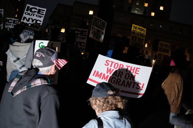 October 22, 2025, New York, New York, USA: A protester hold a sign saying Ã¢â‚¬oeStop The War On ImmigrantsÃ¢â‚¬Â during a demonstration at Foley Square, in New York, on Wednesday, Oct. 22, 2025. This response comes after more than 50 federal agents arrested immigrant vendors at Canal Street, lower Manhattan, on Tuesday. New York USA - ZUMAs368 20251022_zip_s368_010 Copyright: xMarcoxPostigoxStorelx
