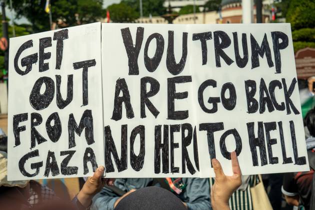 October 26, 2025, Kuala Lumpur, Malaysia: Protesters hold placards during a protest against US President Donald Trump s visit for the Association of Southeast Asian Nations (ASEAN) 47th ASEAN Summit in Kuala Lumpur. Kuala Lumpur Malaysia - ZUMAr146 20251026_zap_r146_005 Copyright: xAsyrafxRasidx