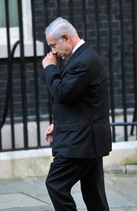 Israeli Prime Minister Benjamin Netanyahu walking to the door at 10 Downing Street Israeli Prime Minister Benjamin Netanyahu arrives for a dinner with Prime Minister David Cameron at 10 Downing Street London, England - 04.05.11, London, United Kingdom WENN 5648477