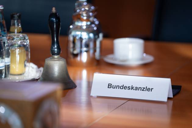 22 Meeting of the Federal Cabinet Impressions of the Cabinet Room of the Federal Cabinet with the nameplate of the Federal Chancellor Berlin Berlin Germany