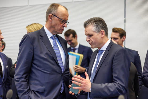 Parliamentary group meeting CDU CSU Federal Chancellor Friedrich Merz CDU and Thorsten Frei CDU , Minister of the Chancellery, at a parliamentary group meeting on 16 12 2025 in Berlin Berlin Berlin Germany Bundestag