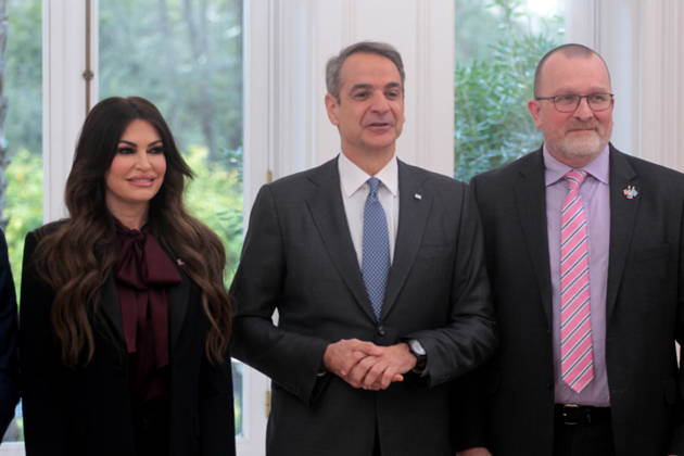 February 16, 2026, Athens, Greece: From left to right, U.S. Ambassador to Greece Kimberly Guilfoyle, Greek Prime Minister Kyriakos Mitsotakis and Gavin Lewis, vice president of new ventures at Chevron, pose after signing an agreement granting rights for exploratory drilling and potential hydrocarbon exploitation south of the Peloponnese and Crete, Greece. Athens Greece  - ZUMAv62_ 20260216_zaf_v62_019 Copyright: xAristidisxVafeiadakisx