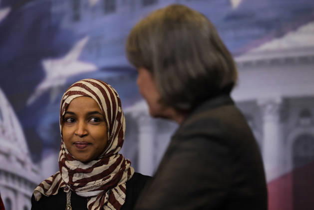 February 24, 2026, Washington, District Of Columbia, USA: U.S. REPRESENTATIVE ILHAN OMAR (D-MN), left, smiles as U.S. REPRESENTATIVE BETTY MCCOLLUM (D-MN) speaks at a press conference denouncing President Trump s upcoming State of the Union address at the U.S. Capitol in Washington, D.C. on February 24, 2026. Washington USA - ZUMAd227 20260224_znp_d227_013 Copyright: xBryanxDozierx
