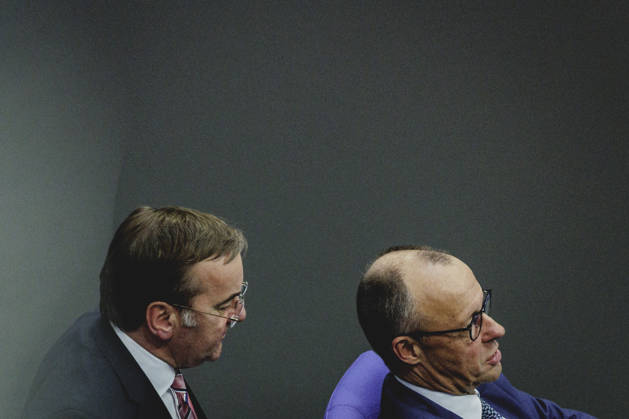 R L Friedrich Merz CDU , Federal Chancellor, and Boris Pistorius SPD , Federal Minister of Defense, recorded during the debate on the government declaration in the German Bundestag in Berlin, 18 03 2026 Berlin Germany Copyright: xFlorianxGaertnerx