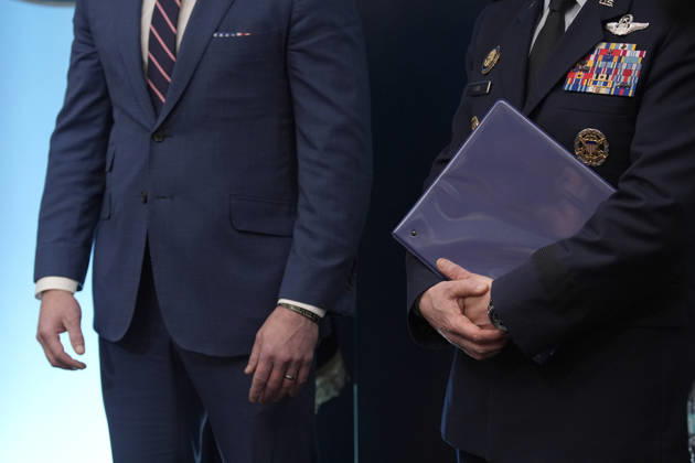 United States Secretary of War Pete Hegseth, left, and US Air Force General Dan Caine, Chair, Joint Chiefs of Staff, right, listen as US President Donald J Trump conducts a press conference in the James S Brady Press Briefing Room of the White House in Washington, DC, USA, on Monday April 6, 2026. The President is expected to take questions on the Iran War and oil prices. Copyright: xIndependentxStillxPoolxphotox 2026xAbacaUSAxfromxConsolidatedxNewsxPhotosxAllxRightsxReservex MediaPunchx