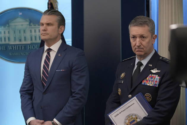 United States Secretary of War Pete Hegseth, left, and US Air Force General Dan Caine, Chair, Joint Chiefs of Staff, right, listen as US President Donald J Trump conducts a press conference in the James S Brady Press Briefing Room of the White House in Washington, DC, USA, on Monday April 6, 2026. The President is expected to take questions on the Iran War and oil prices. Copyright: xIndependentxStillxPoolxphotox 2026xAbacaUSAxfromxConsolidatedxNewsxPhotosxAllxRightsxReservex MediaPunchx