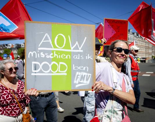 AMSTERDAM - Demonstrators during an FNV march against the coalition agreement on Labour Day. The union believes that Europe is scaling back legislation and regulations that protect workers too much. SEM VAN DER WAL ANP netherlands out - belgium out  Copyright: xx x557208786x originalFilename: 557208786