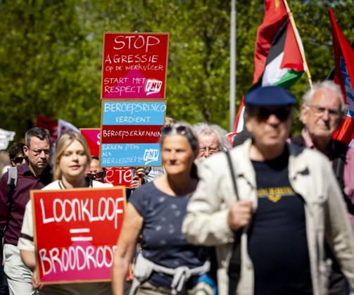 AMSTERDAM - Demonstrators during an FNV march against the coalition agreement on Labour Day. The union believes that Europe is scaling back legislation and regulations that protect workers too much. SEM VAN DER WAL ANP netherlands out - belgium out  Copyright: xx x557209770x originalFilename: 557209770