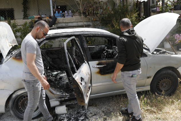 Palestinians inspect damage after settler attack near Hebron Palestinians inspect damage at the site of an attack carried out by Israeli settlers targeting Palestinian vehicles and property in the town of Surif northwest of Hebron in the occupied West Bank on May 17, 2026. Settlers set fire to a vehicle and spray-painted racist slogans at the scene, amid anger and condemnation among Palestinian residents over repeated attacks on their property. Photo by Mamoun Wazwaz apaimages Hebron West Bank Palestinian Territory 170526_Hebron_MW_00(13) Copyright: xapaimagesxMamounxWazwazx xapaimagesx