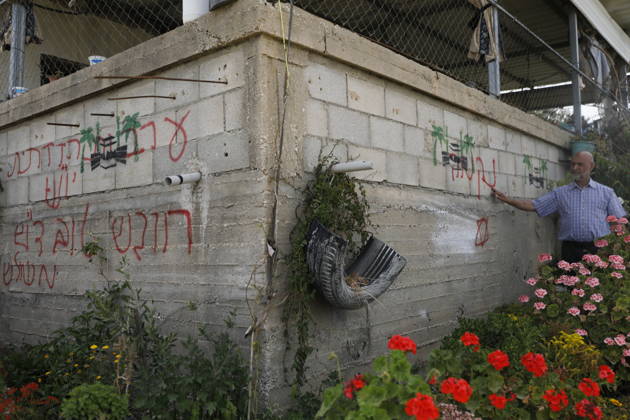 Palestinians inspect damage after settler attack near Hebron Palestinians inspect damage at the site of an attack carried out by Israeli settlers targeting Palestinian vehicles and property in the town of Surif northwest of Hebron in the occupied West Bank on May 17, 2026. Settlers set fire to a vehicle and spray-painted racist slogans at the scene, amid anger and condemnation among Palestinian residents over repeated attacks on their property. Photo by Mamoun Wazwaz apaimages Hebron West Bank Palestinian Territory 170526_Hebron_MW_00(25) Copyright: xapaimagesxMamounxWazwazx xapaimagesx