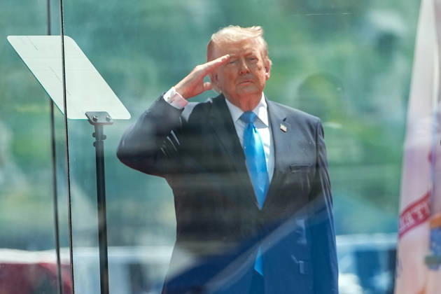 President Donald Trump salutes during the National Anthem before delivering the commencement address at the United States Coast Guard Academy s graduation ceremony in New London, Connecticut on Wednesday, May 20, 2026. CONN20260520434 ANGELINAxKATSANIS