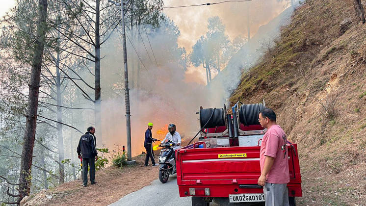 Firefighting operations underway after fire breaks out in a forest Bageshwar, May 21 (ANI): Firefighting operations underway after fire breaks out in a forest, in Bageshwar on Thursday. Bageshwar Uttarakhand India Copyright: xANIx ANI_20260521397