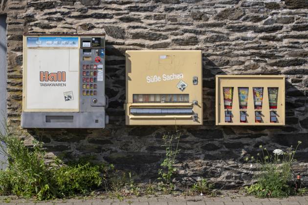 Vending machines, cigarette vending machine, candy vending machine, and on the right, a classic old gum vending machine; small items, toys; near St. Goar, Rhineland-Palatinate, Germany; vending machines