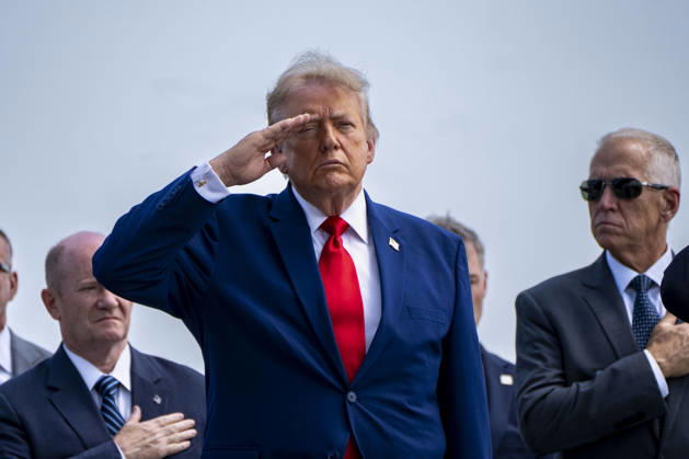 President Donald Trump salutes during the dignified transfer of Army 1st Lt. Tyler James Feehan, Army Staff Sgt. Emmanuel Swinton, Army Sgt. Angel Rampersad and Army Pvt. Isabella Gonzales at Dover Air Force Base in Dover, Delaware on Wednesday, July 22, 2026. WAP20260722355 BONNIExCASH