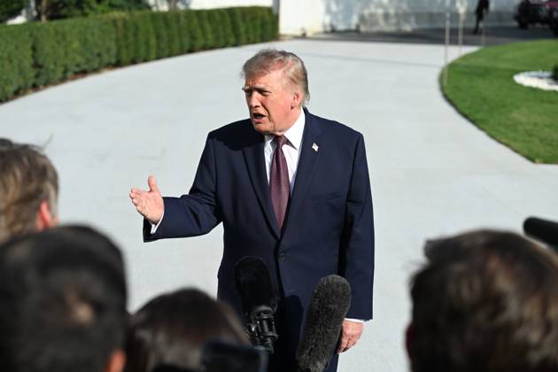 October 2, 2026, Washington, Dc, USA: U.S. President Donald Trump talks to the media before boarding Marine One on the South Lawn of the White House in Washington, DC, United States, on October 2, 2026. Washington USA - ZUMAs197 20261002_aaa_s197_268 Copyright: xKylexMazzax