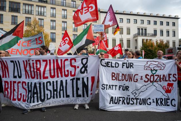 October 3, 2026, Berlin, Germany: BERLIN, GERMANY †OCTOBER 3, 2026: Thousands of people took part in a peace demonstration in central Berlin on German Unity Day. A coalition of peace initiatives, trade unions, and political and civil-society groups organized the protest. The demonstrators focused on military rearmament, the possible reintroduction of conscription, and Germanyâ€⠢s military policy. The march began at the Brandenburg Gate and continued through the government district before concluding with a rally. The demonstration brought together participants expressing opposition to Germanyâ€⠢s current and proposed military policies on a national public holiday. Berlin Germany - ZUMAq101 20261003_zna_q101_093 Copyright: xJessxFlomx