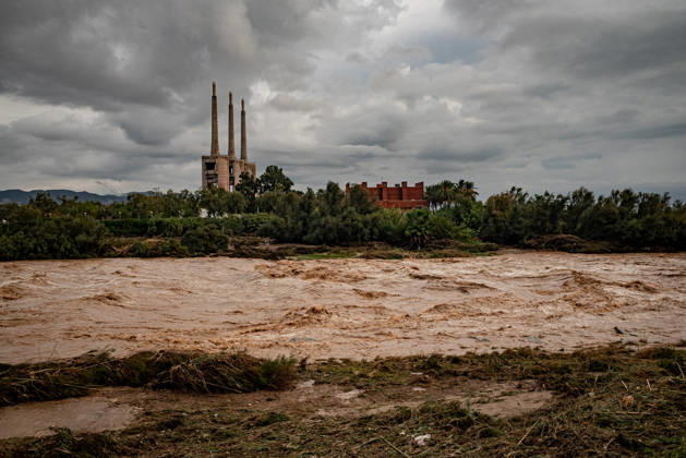 October 4, 2026, Sant Adria Del Besos, Barcelona, Spain: The mouth of the Besos River, north of Barcelona, is swollen and laden with sediment after a night of torrential rain across Catalonia. The storm brought exceptional rainfall to the Barcelona metropolitan area, with more than 200 litres per square metre recorded in parts of the region. The Besos rose sharply overnight, prompting authorities to warn of an imminent risk of flooding. Sant Adria Del Besos Spain - ZUMAb137 20261004_fap_b137_003 Copyright: xJordixBoixareux