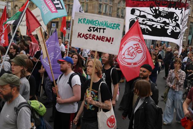 October 3, 2026, Berlin, Berlin, Germany: BERLIN, GERMANY, OCTOBER 3, 2026: Thousands of demonstrators march through central Berlin during a protest against Germany s military buildup, increased defense spending and the possible reintroduction of compulsory military service. Protesters called for greater investment in healthcare, housing, education and other social services instead of military spending, while participants also demonstrated against German arms deliveries and support for Israel amid the war in Gaza. The march began at the Brandenburg Gate and continued through central Berlin before returning to the area. Berlin Germany - ZUMAq101 20261003_zna_q101_215 Copyright: xZairaxBiaginix