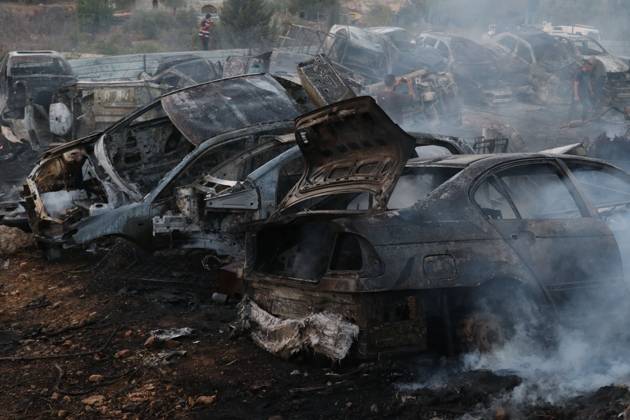Israeli Settlers Set Fire To Olive Trees And Car Scrap Yard Near Silwad SILWAD, WEST BANK, PALESTINE OCTOBER 4, 2026: Israeli settlers set fire to olive trees and a car scrap yard between the villages of Ein Yabrud and Silwad, according to the information provided. The owner of the repair shop said more than 50 cars were destroyed in the fire. The incident occurred amid ongoing attacks targeting Palestinian property and agricultural land in the area. Fires affecting olive trees and other Palestinian property have also been reported in areas around Silwad. Ramallah Palestine, State of Copyright: x xSalmanxMohsenxAlkhatibx xJNAxPressx