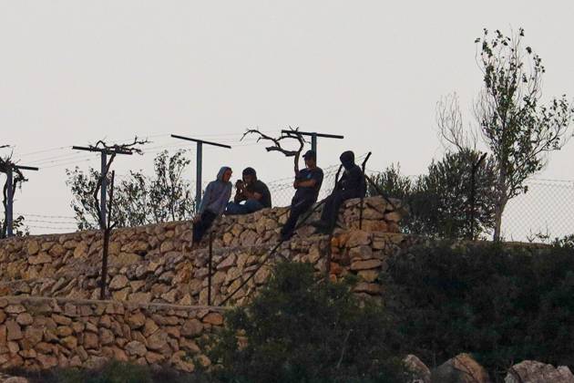 Israeli Settlers Set Fire To Olive Trees And Car Scrap Yard Near Silwad SILWAD, WEST BANK, PALESTINE OCTOBER 4, 2026: Israeli settlers set fire to olive trees and a car scrap yard between the villages of Ein Yabrud and Silwad, according to the information provided. The owner of the repair shop said more than 50 cars were destroyed in the fire. The incident occurred amid ongoing attacks targeting Palestinian property and agricultural land in the area. Fires affecting olive trees and other Palestinian property have also been reported in areas around Silwad. Ramallah Palestine, State of Copyright: x xSalmanxMohsenxAlkhatibx xJNAxPressx