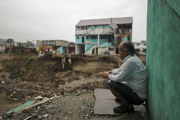Heavy rains linked to El Nino trigger severe land collapse in Guatemala SAN MIGUEL PETAPA, GUATEMALA - OCTOBER 04: Residents try to go on with their daily lives amid severe damage and collapsed structures in the Villa Hermosa I neighborhood following relentless rainfall and the overflow of the Pinula River in San Miguel Petapa, Guatemala on October 04, 2026. The rising waters, linked to the El Nino phenomenon, triggered extensive riverbank erosion and land loss, damaging several homes and leaving nearby properties at continuous risk of collapse. Luis Vargas Anadolu San Miguel Petapa Guatemala. Editorial use only. Please get in touch for any other usage.  Copyright: x2026xAnadoluxLuisxVargasx