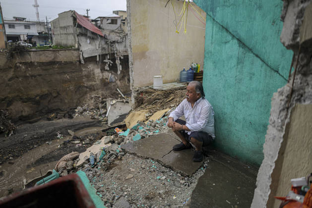 Heavy rains linked to El Nino trigger severe land collapse in Guatemala SAN MIGUEL PETAPA, GUATEMALA - OCTOBER 04: Residents try to go on with their daily lives amid severe damage and collapsed structures in the Villa Hermosa I neighborhood following relentless rainfall and the overflow of the Pinula River in San Miguel Petapa, Guatemala on October 04, 2026. The rising waters, linked to the El Nino phenomenon, triggered extensive riverbank erosion and land loss, damaging several homes and leaving nearby properties at continuous risk of collapse. Luis Vargas Anadolu San Miguel Petapa Guatemala. Editorial use only. Please get in touch for any other usage.  Copyright: x2026xAnadoluxLuisxVargasx