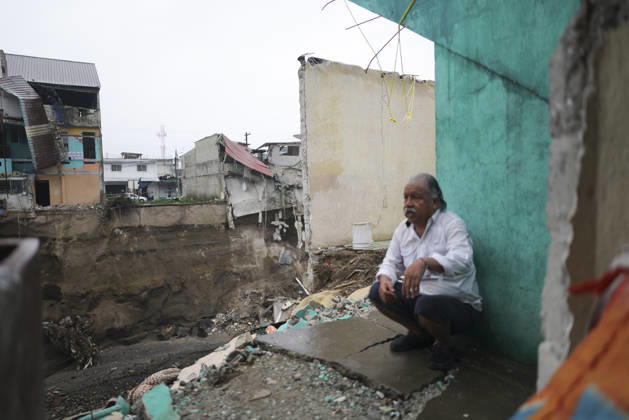 Heavy rains linked to El Nino trigger severe land collapse in Guatemala SAN MIGUEL PETAPA, GUATEMALA - OCTOBER 04: Residents try to go on with their daily lives amid severe damage and collapsed structures in the Villa Hermosa I neighborhood following relentless rainfall and the overflow of the Pinula River in San Miguel Petapa, Guatemala on October 04, 2026. The rising waters, linked to the El Nino phenomenon, triggered extensive riverbank erosion and land loss, damaging several homes and leaving nearby properties at continuous risk of collapse. Luis Vargas Anadolu San Miguel Petapa Guatemala. Editorial use only. Please get in touch for any other usage.  Copyright: x2026xAnadoluxLuisxVargasx
