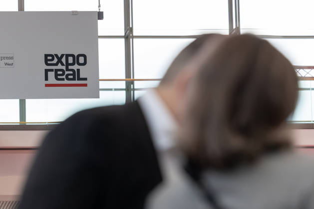 EXPO REAL 2026 in Munich, October 5, 2026: Trade visitors on their way to the exhibition halls at the Messe München grounds. First day of EXPO REAL 2026, the international trade fair for real estate, investments, and infrastructure will take place from October 5 to 7, 2026, in Munich, bringing t