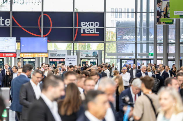 EXPO REAL 2026 in Munich, October 5, 2026: Trade visitors on their way to the exhibition halls at the Messe München grounds. First day of EXPO REAL 2026, the international trade fair for real estate, investments, and infrastructure will take place in Munich from October 5 to 7, 2026, bringing to