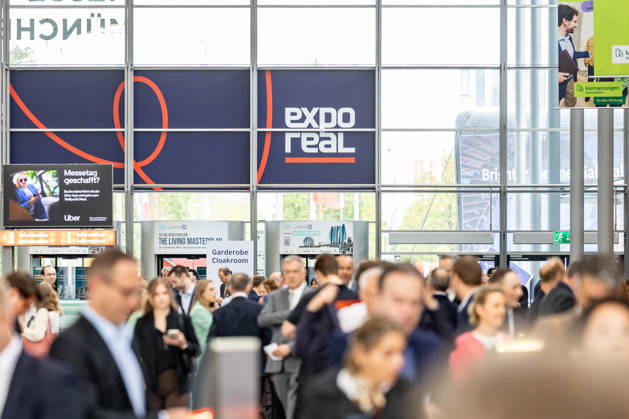 EXPO REAL 2026 in Munich, October 5, 2026: Trade visitors on their way to the exhibition halls at the Messe München grounds. First day of EXPO REAL 2026, the international trade fair for real estate, investments, and infrastructure will take place from October 5 to 7, 2026, in Munich, bringing t