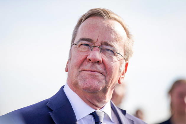 Germany, Emden: Federal Minister of Defense Boris Pistorius gazes into the distance during a press conference on the decision regarding the German Navy’s new naval base in Emden. Flags are visible in the background. Portrait, side profile, low-angle shot, Boris Pistorius, Federal Minister of Defense, Federa Copyright: xJOERANxSTEINSIEKx