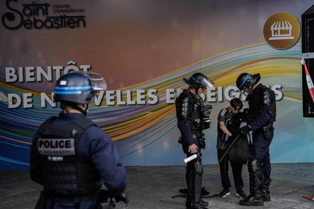 Student protests continue across France as up to 500 high schools close NANCY, FRANCE - OCTOBER 5: Police search a student s bag during protest against current education conditions disrupt classes across the country in Nancy, France on October 5, 2026. Demonstrators pushed for expanded resources, improved school maintenance, smaller class sizes, and strategies to tackle staffing shortages. The countrywide action disrupted learning at roughly 400 to 500 high schools, which experienced full or partial class suspensions. Muhammed Said Tako Anadolu Nancy France. Editorial use only. Please get in touch for any other usage. Copyright: x2026xAnadoluxMuhammedxSaidxTakox