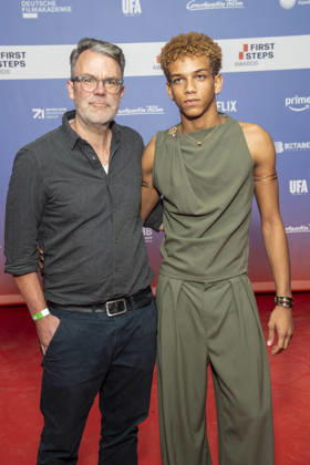 ABB FIRSTSTEPS: Robert Thalheim and Salimou Thiam on the red carpet at the 2026 FIRST STEPS Awards ceremony at the Theater des Westens on October 5, 2026, in Berlin, Germany