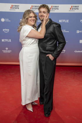 ABB FIRSTSTEPS: Gisa Flake and Knud Riepen walk the red carpet at the 2026 FIRST STEPS Awards ceremony at the Theater des Westens on October 5, 2026, in Berlin, Germany