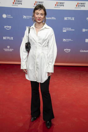 ABB FIRSTSTEPS: Linda Belinda Podszus walks the red carpet at the 2026 FIRST STEPS Awards ceremony at the Theater des Westens on October 5, 2026, in Berlin, Germany