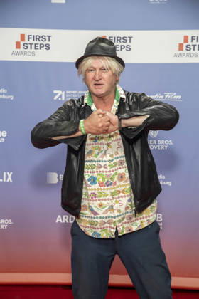 ABB FIRSTSTEPS: Detlev Buck appears on the red carpet at the 2026 FIRST STEPS Awards ceremony at the Theater des Westens on October 5, 2026, in Berlin, Germany