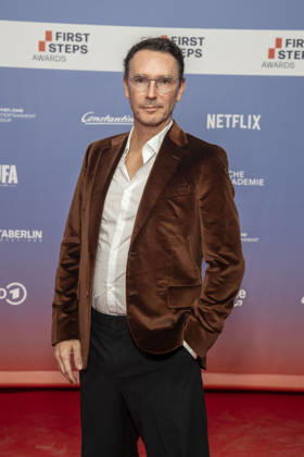 ABB FIRSTSTEPS: Sascha Schwingel walks the red carpet at the 2026 FIRST STEPS Awards ceremony at the Theater des Westens on October 5, 2026, in Berlin, Germany