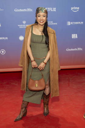 ABB FIRSTSTEPS: Trang Le Hong walks the red carpet at the 2026 FIRST STEPS Awards ceremony at the Theater des Westens on October 5, 2026, in Berlin, Germany