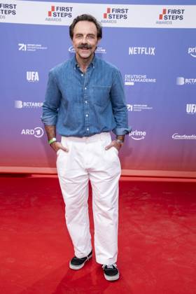 ABB FIRSTSTEPS: Aleksandar Jovanovic walks the red carpet at the 2026 FIRST STEPS Awards ceremony at the Theater des Westens on October 5, 2026, in Berlin, Germany