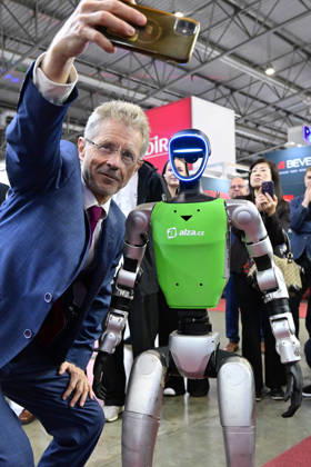 Czech Senate President Milos Vystrcil takes a selfie with a humanoid robot at opening of the 67th International Engineering Fair, which begins at Vystaviste 1 exhibition grounds in Brno, Czech Republic, on October 6th, 2026. International Fair of Machine Tools and Forming Machines IMT, International Welding Engineering Fair Welding, International Fair of Plastics, Rubber and Composites Plastex, International Fair of Surface Treatment Technologies Profintech and International Foundry Fair Fond-Ex also start. (CTKxPhoto VaclavxSalek) CTKPhotoP2026100605271  CTKPhotoP2026100605271