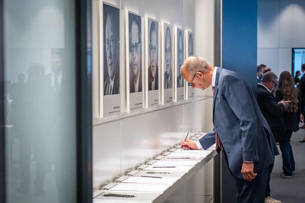 Chancellor Friedrich Merz signs the attendance sheet before the CDU and CSU caucus meeting CDU and CSU caucus meeting in the German Bundestag, Berlin, Berlin, Germany, Bundestag