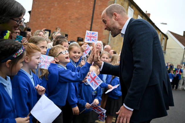 The Prince Of Wales Visits Ilminster ILMINSTER, ENGLAND - OCTOBER 06: Prince William, Prince of Wales, high-fives members from the local school during his visit to Sweet Surprise cafe on October 06, 2026 in Ilminster, England. The Prince of Wales visited Ilminster in Somerset to learn about communities growing their resilience to wild fires, flood and challenges caused by extreme weather and global warming., Credit:Finnbarr Webster PA ROTA - B68 Avalon United Kingdom, England, Ilminster  Copyright: xFinnbarrxWebsterx xPAxROTAx-xB68x xAvalonx 1141004116