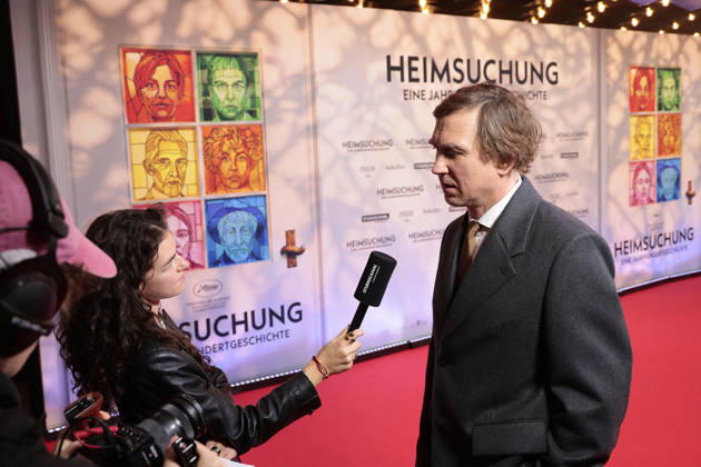Lars Eidinger attends the premiere of *Heimsuchung: The Beloved* at Kino International on October 6, 2026, in Berlin, Germany. *Heimsuchung: The Beloved* premiere in Berlin, Germany