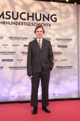 Lars Eidinger at the premiere of *Heimsuchung* on October 6, 2026, at Kino International in Berlin. Lars Eidinger attends the premiere of *Heimsuchung: The Beloved* at Kino International on October 6, 2026, in Berlin, Germany. *Heimsuchung* film premiere in Berlin