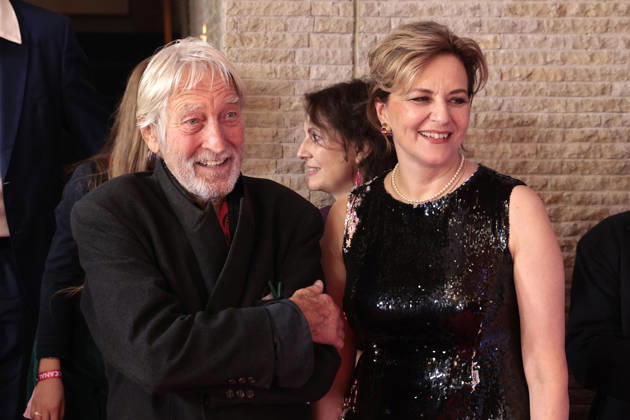 Wigand Witting and Martina Gedeck attend the premiere of *Heimsuchung: The Beloved* at Kino International on October 6, 2026, in Berlin, Germany. *Heimsuchung: The Beloved* premiere in Berlin, Germany